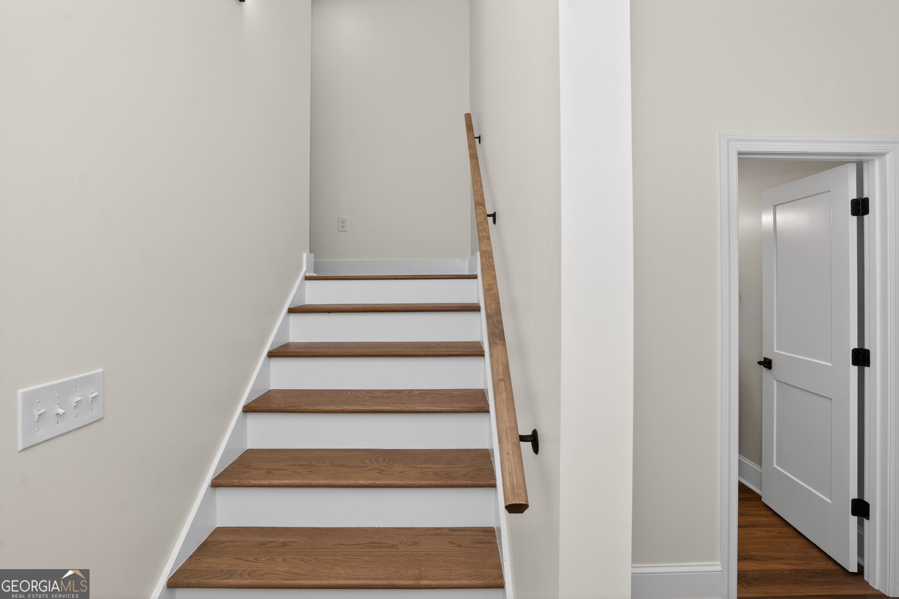 166 Midway Road Barnesville, GA 30204 - Photo 45 of 62 a view of staircase with white walls and white walls