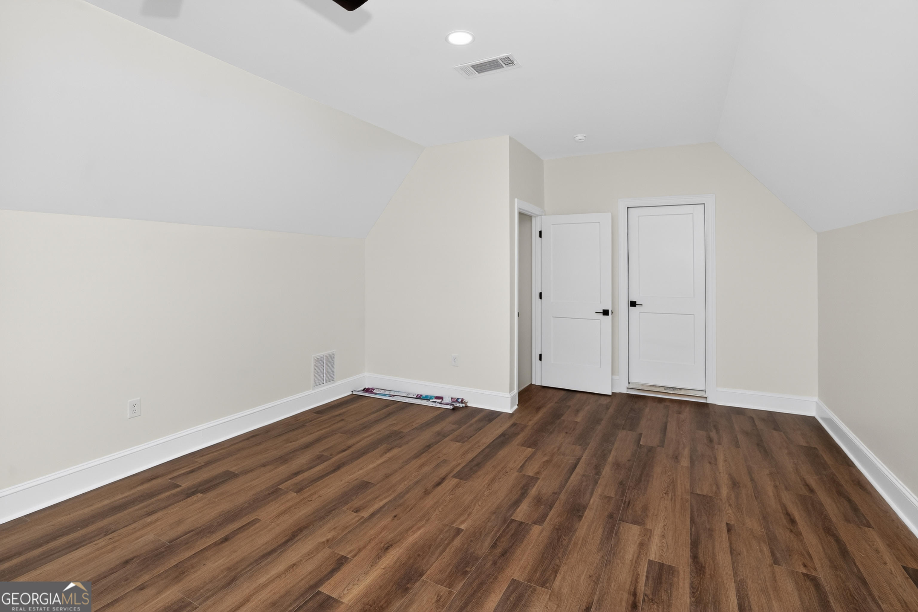 166 Midway Road Barnesville, GA 30204 - Photo 49 of 62 a view of an empty room with wooden floor