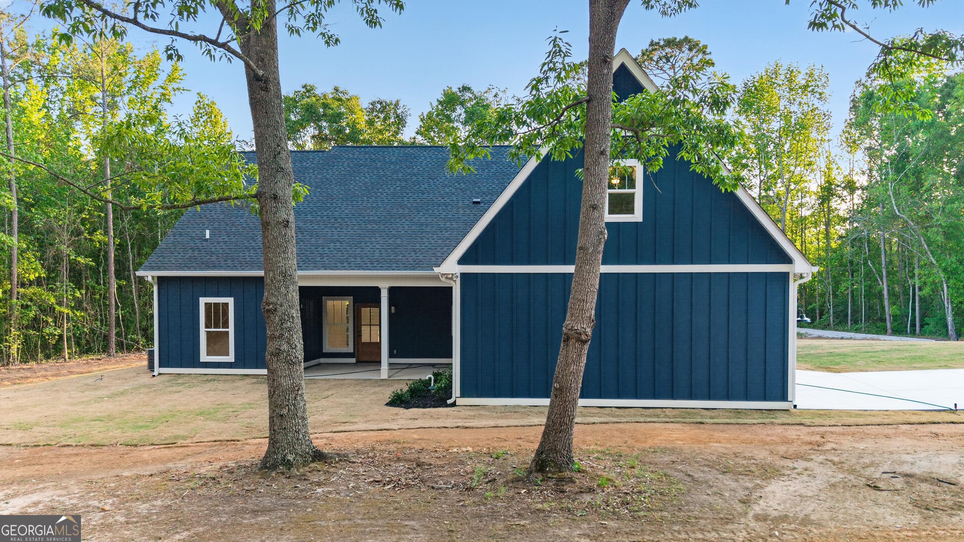 166 Midway Road Barnesville, GA 30204 - Photo 51 of 62 a view of a house with a tree