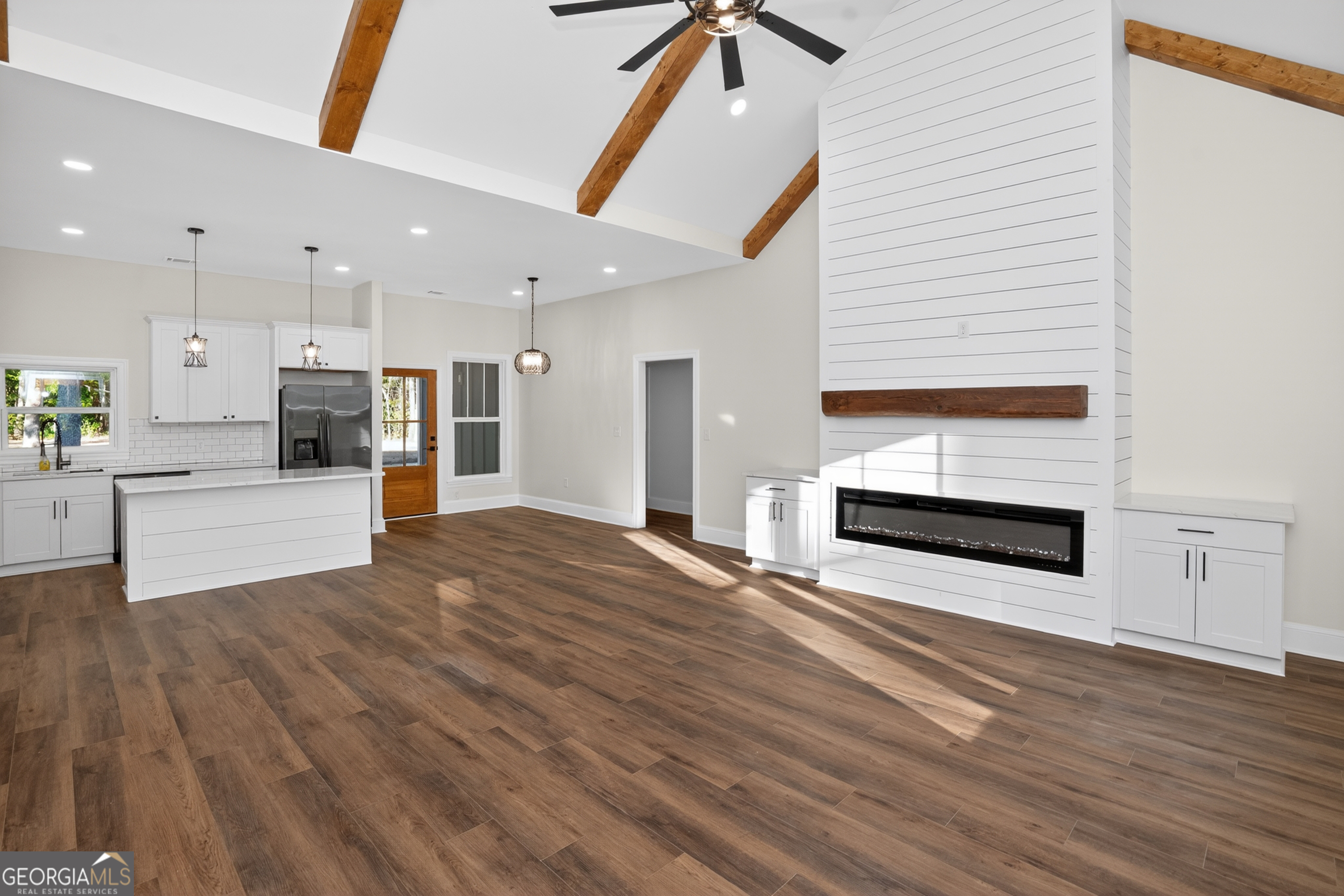 166 Midway Road Barnesville, GA 30204 - Photo 7 of 62 a view of a kitchen with wooden floor