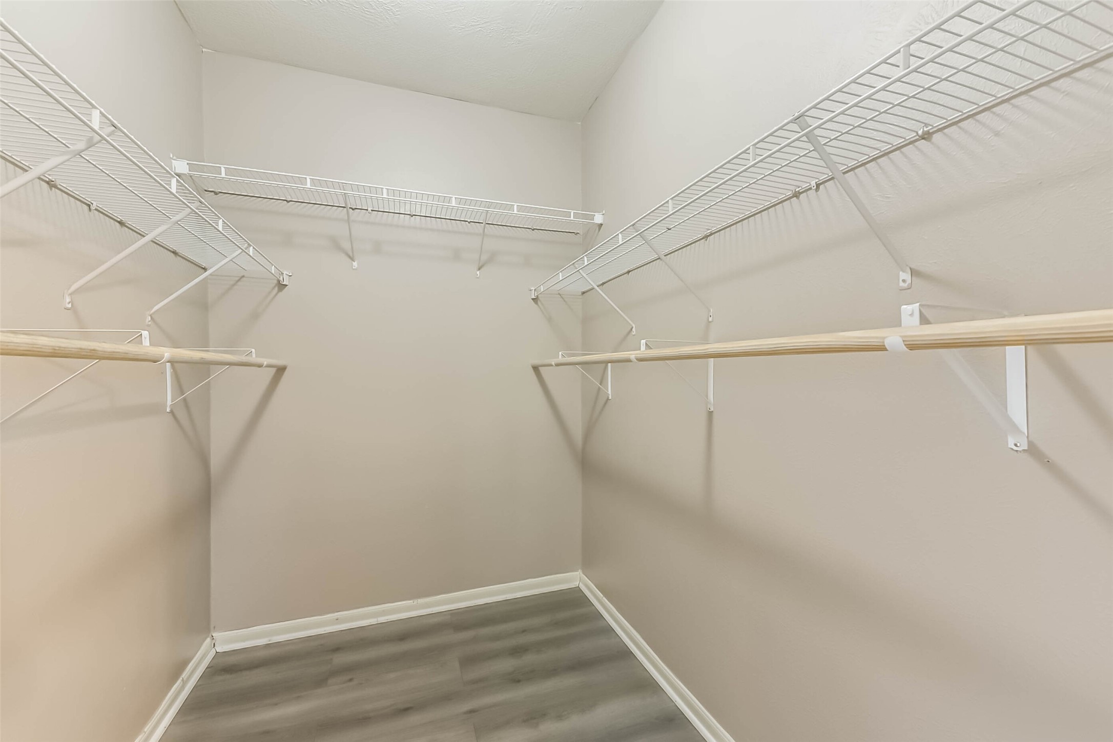 10114 Sand Tracks Court Houston, TX 77064 - Photo 25 of 49 a view of a room with racks on the wall