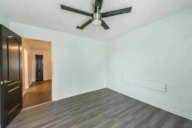 a view of a livingroom with wooden floor