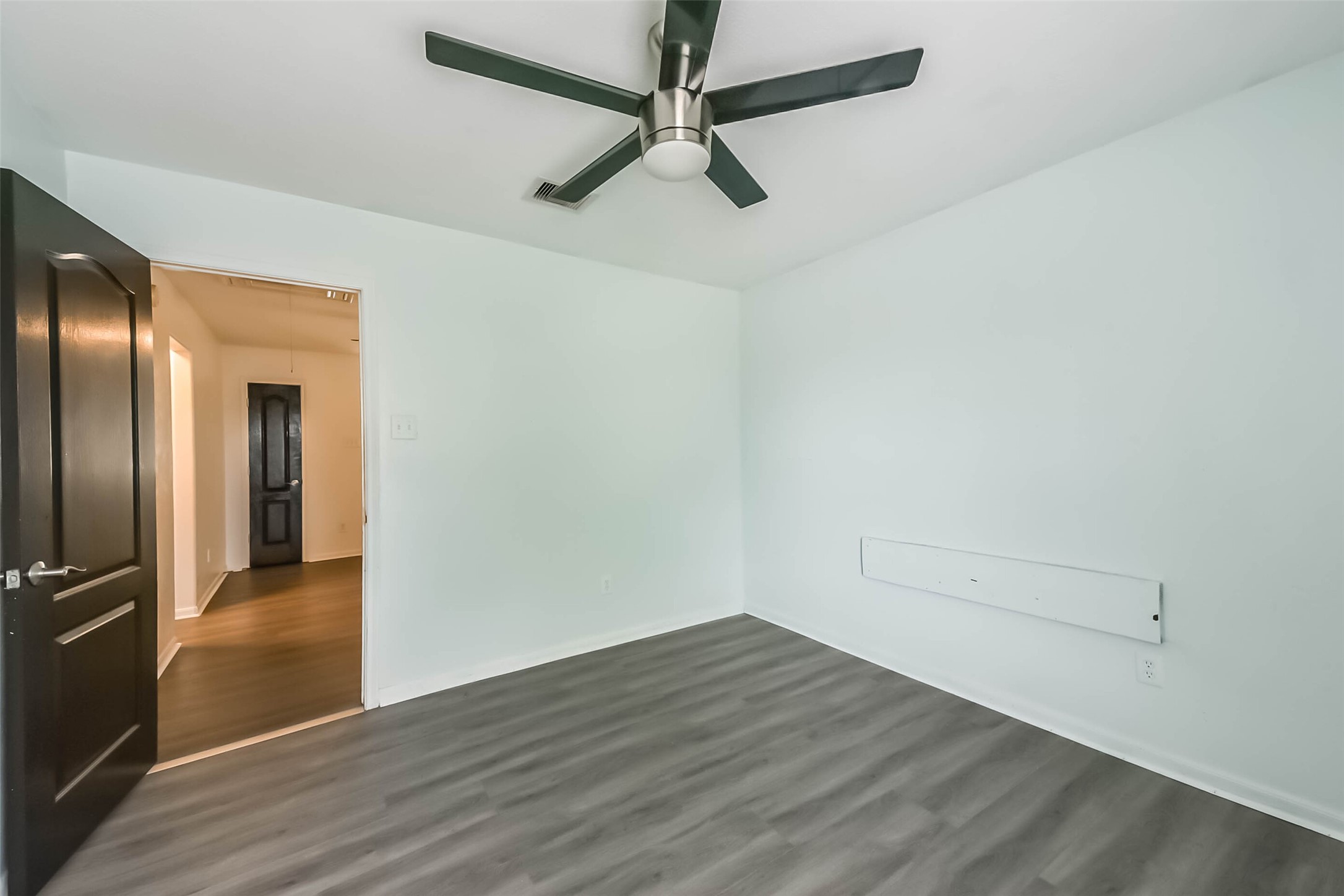 10114 Sand Tracks Court Houston, TX 77064 - Photo 34 of 49 a view of a livingroom with wooden floor