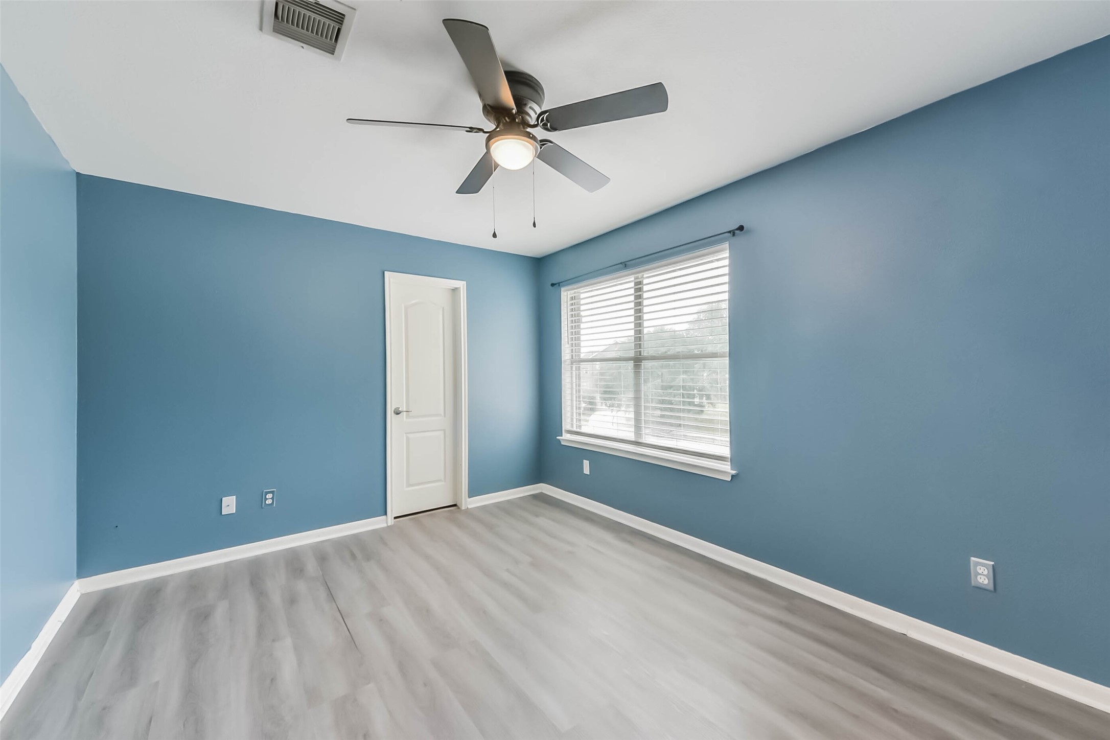 10114 Sand Tracks Court Houston, TX 77064 - Photo 35 of 49 a view of an empty room with a window