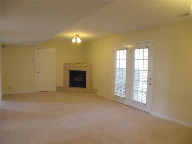 1923 Clara Mathis Road Spring Hill, TN 37174 - Photo 13 of 20 27 x 13 Rec Room with fireplace