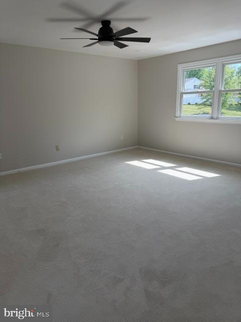 12 Wren Road Gilbertsville, PA 19525 - Photo 5 of 17 an empty room with windows and ceiling fan