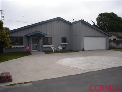 569 East Foster Road Santa Maria, CA 93455 - Photo 1 of 3 a view of a house with a yard