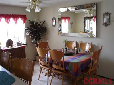 569 East Foster Road Santa Maria, CA 93455 - Photo 3 of 3 a view of a dining room with furniture and chandelier
