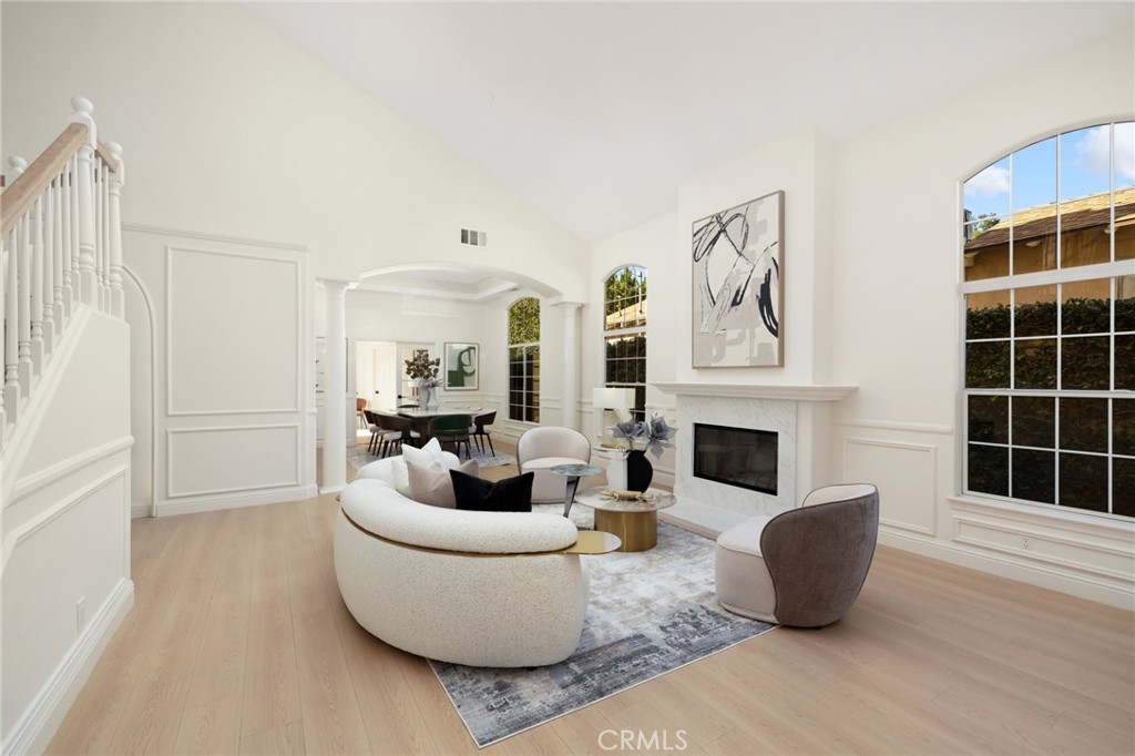 315 San Antonio Road Arcadia, CA 91007 - Photo 17 of 63 a living room with furniture a fireplace and a potted plant