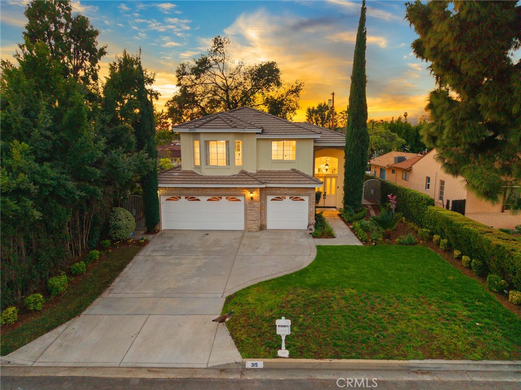 315 San Antonio Road Arcadia, CA 91007 - Photo 7 of 63 a front view of a house with garden