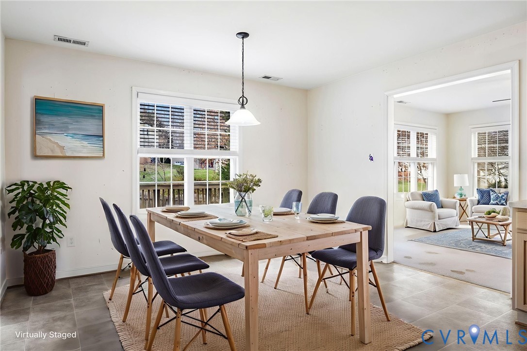 3120 Clintwood Road Midlothian, VA 23112 - Photo 13 of 38 a view of a dining room with furniture window and outside view