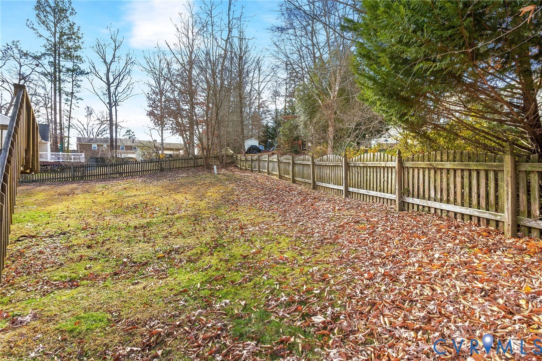 3120 Clintwood Road Midlothian, VA 23112 - Photo 29 of 38 a view of a yard with wooden fence