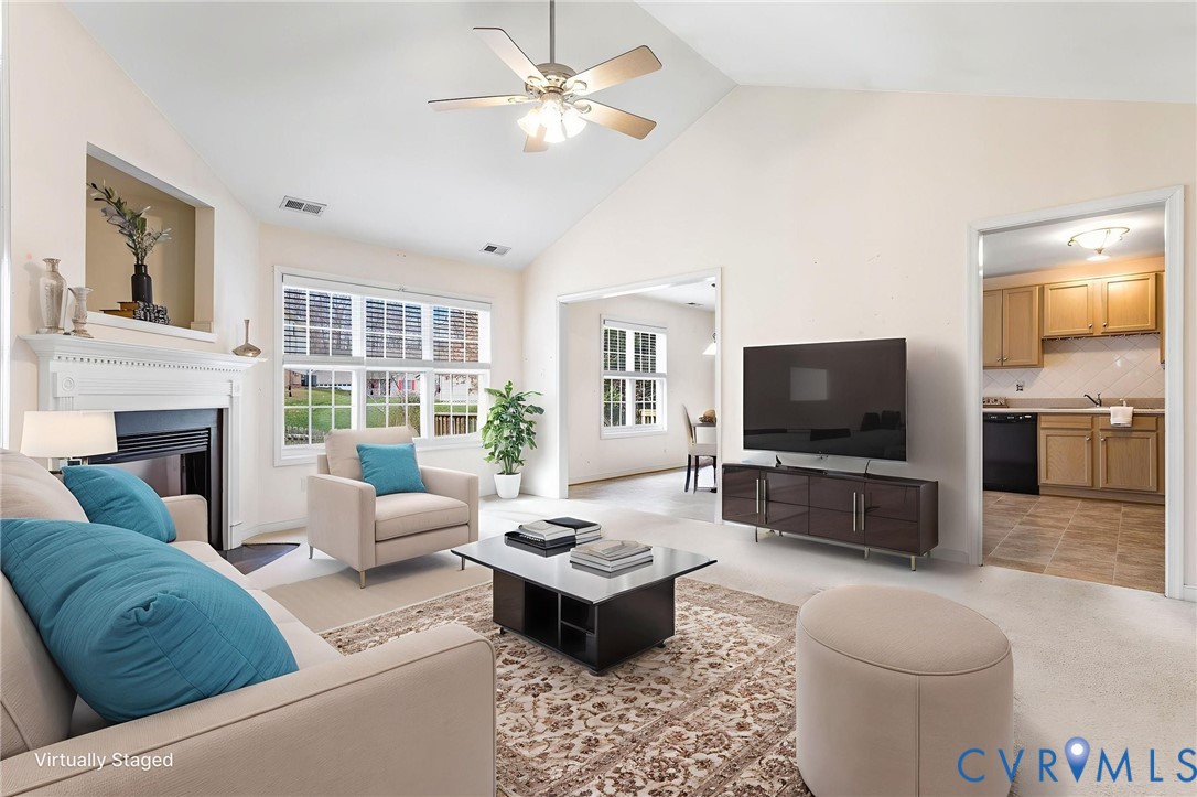 3120 Clintwood Road Midlothian, VA 23112 - Photo 6 of 38 a living room with furniture and a flat screen tv
