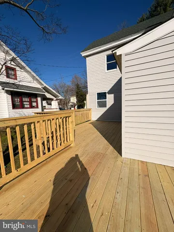 a view of wooden balcony and staircase