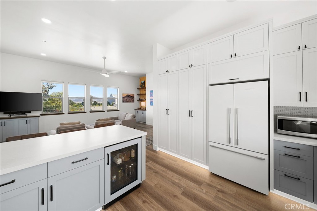 1301 Los Osos Valley Road Los Osos, CA 93402 - Photo 14 of 75 a kitchen with a sink and white cabinets