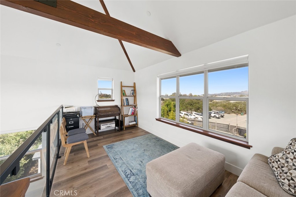 1301 Los Osos Valley Road Los Osos, CA 93402 - Photo 20 of 75 a living room with furniture and a floor to ceiling window