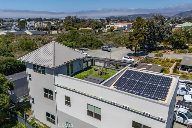 an aerial view of a house with a garden