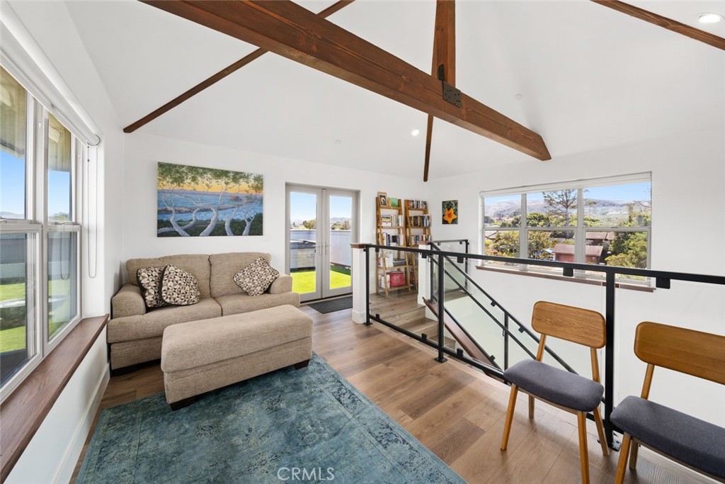 1301 Los Osos Valley Road Los Osos, CA 93402 - Photo 21 of 75 a living room with furniture and a floor to ceiling window