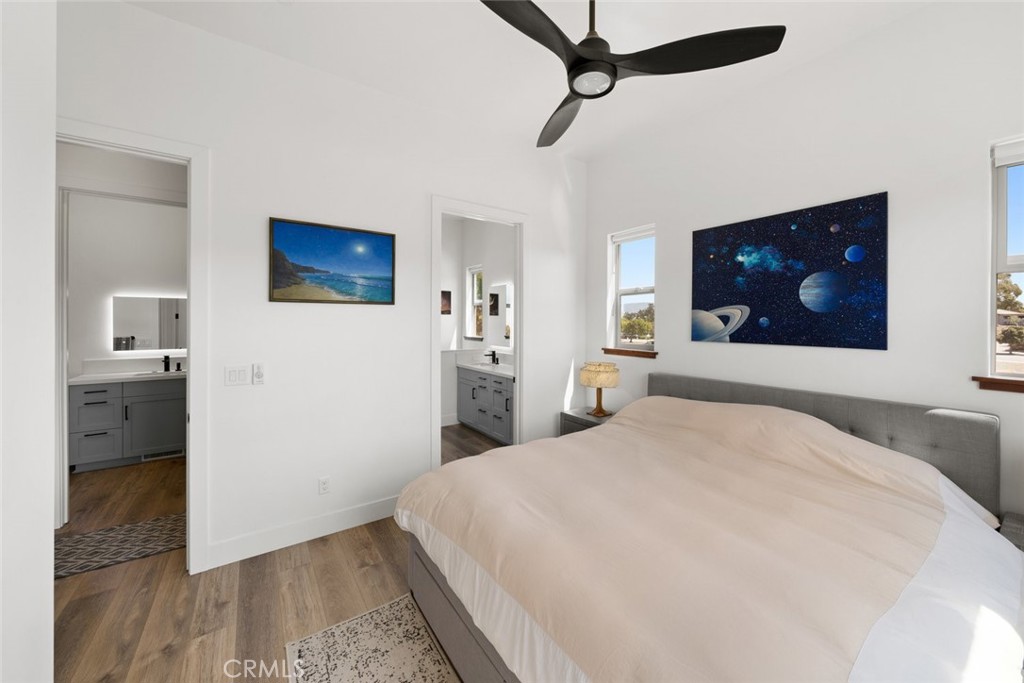 1301 Los Osos Valley Road Los Osos, CA 93402 - Photo 24 of 75 a bedroom with a bed and a flat screen tv