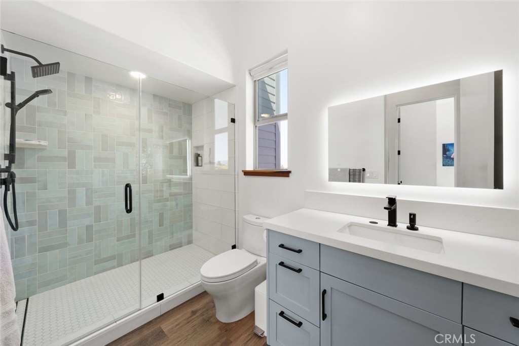 1301 Los Osos Valley Road Los Osos, CA 93402 - Photo 30 of 75 a bathroom with a sink a toilet and shower