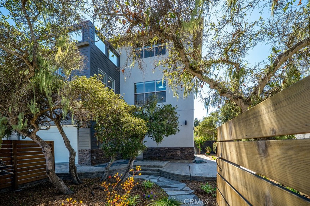 1301 Los Osos Valley Road Los Osos, CA 93402 - Photo 3 of 75 a front view of a house with a garden