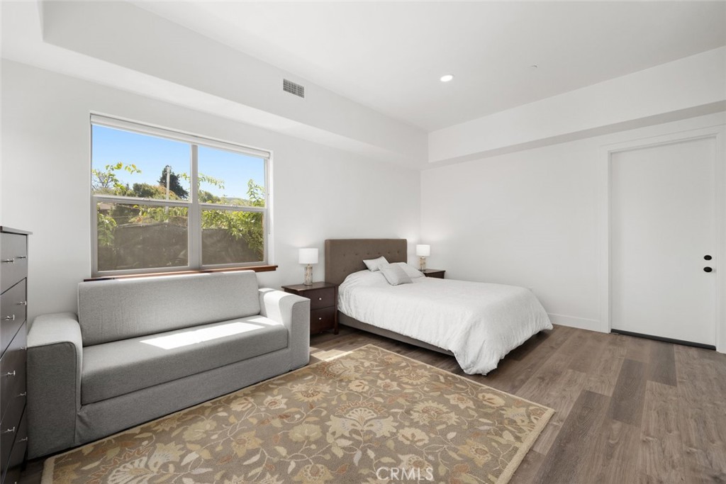 1301 Los Osos Valley Road Los Osos, CA 93402 - Photo 34 of 75 a bedroom with a bed and a couch