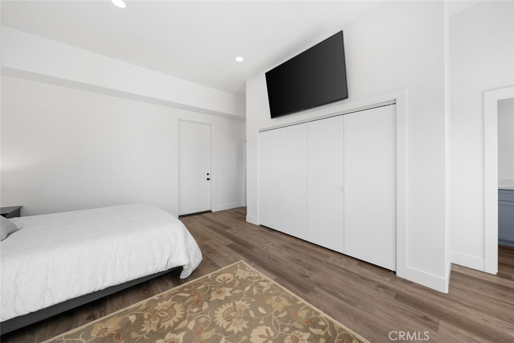 1301 Los Osos Valley Road Los Osos, CA 93402 - Photo 35 of 75 a bedroom with a bed and a flat screen tv