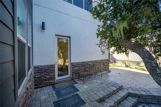 an aerial view of a houses with a outdoor space