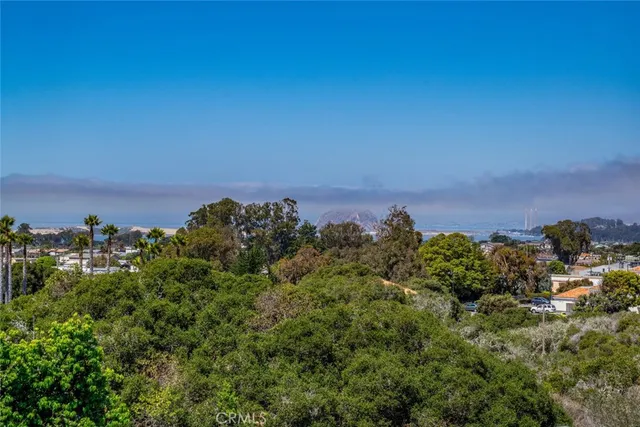 a view of a backyard with sitting area