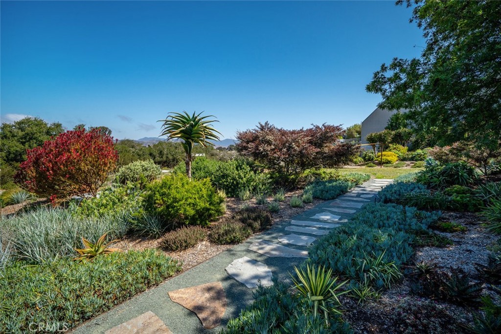 1301 Los Osos Valley Road Los Osos, CA 93402 - Photo 70 of 75 a view of a garden with plants and large trees