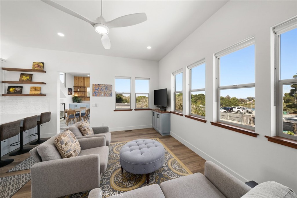 1301 Los Osos Valley Road Los Osos, CA 93402 - Photo 8 of 75 a living room with furniture and a large window with kitchen view