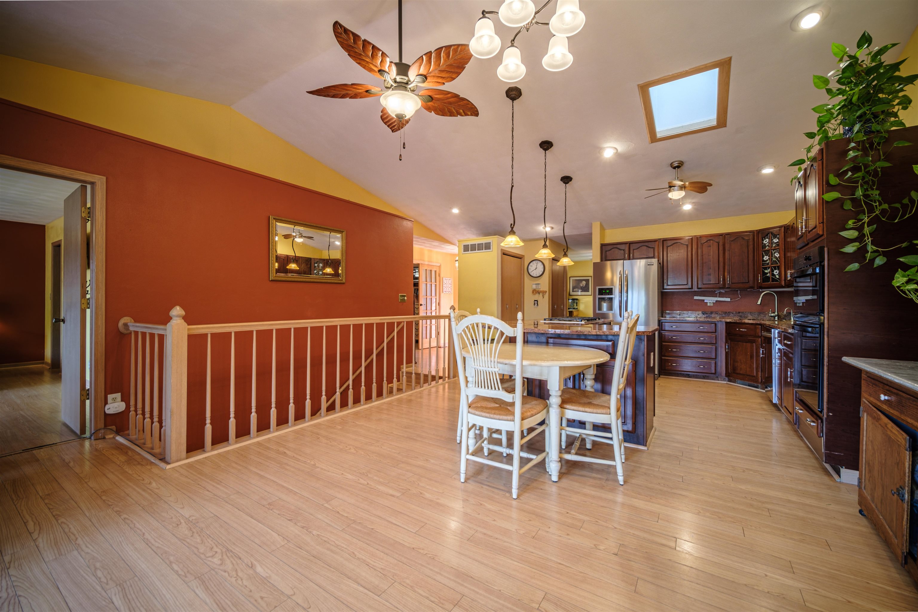 5592 Spring Brook Road Rockford, IL 61114 - Photo 21 of 53 a dining room with furniture and wooden floor