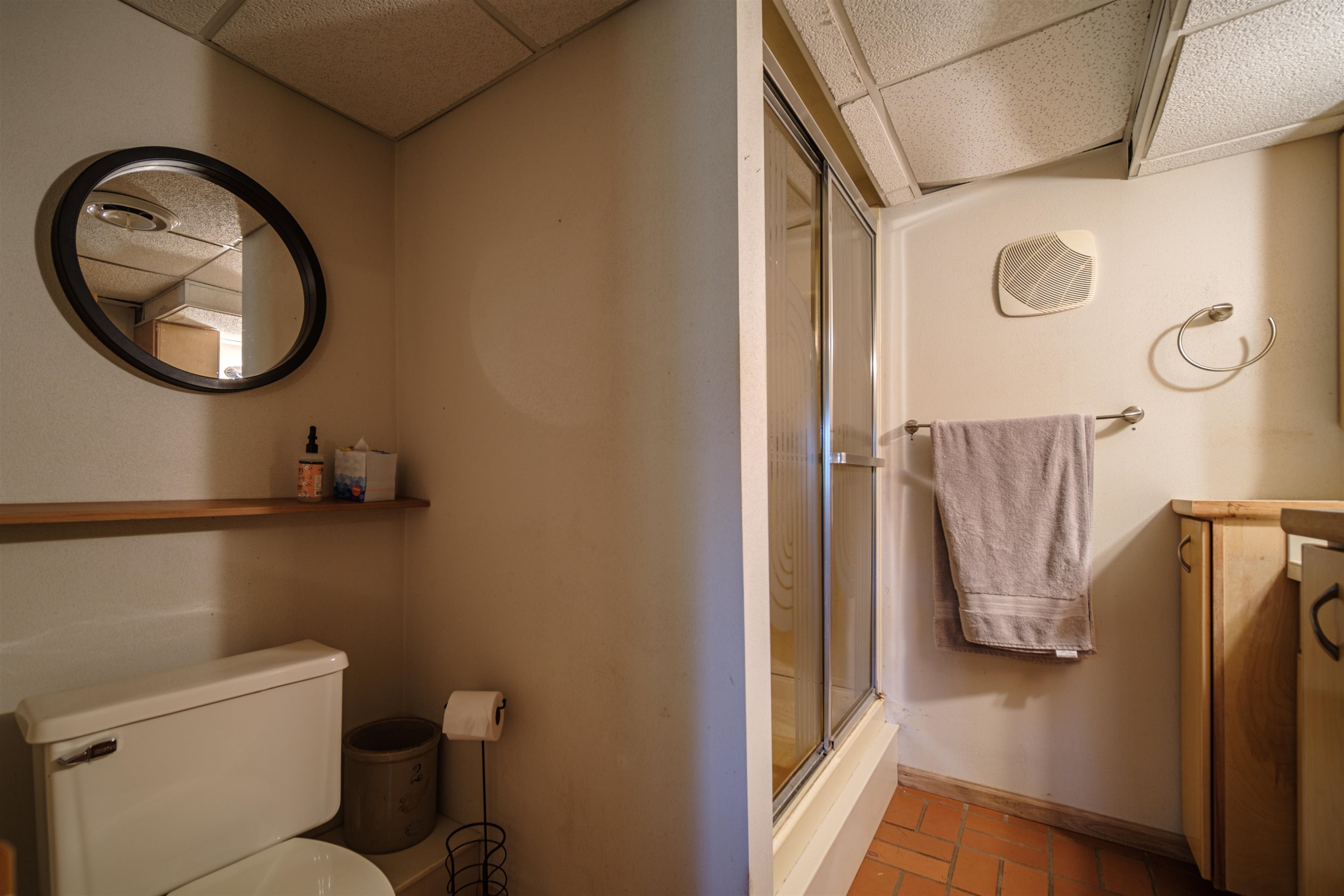 5592 Spring Brook Road Rockford, IL 61114 - Photo 35 of 53 a bathroom with a toilet and a mirror