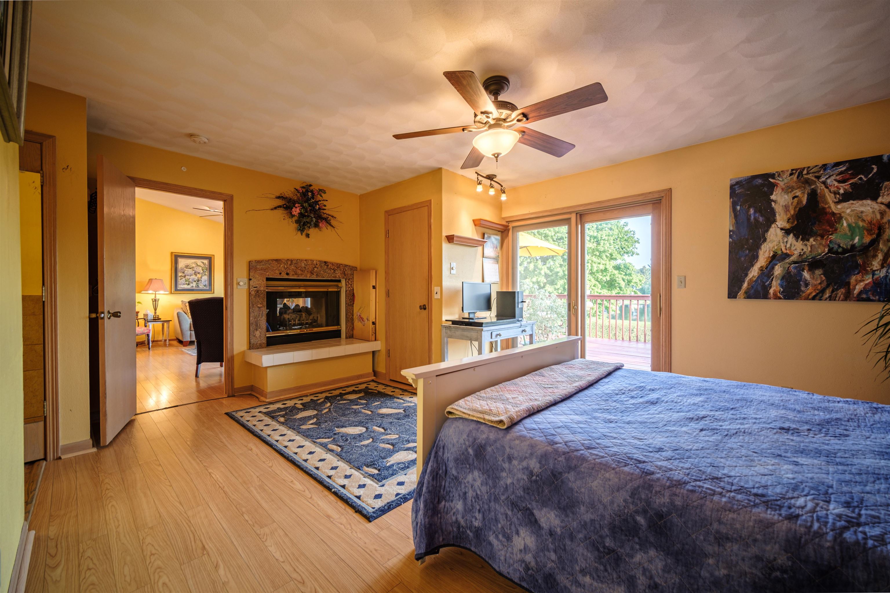 5592 Spring Brook Road Rockford, IL 61114 - Photo 10 of 53 a bedroom with a bed and a flat screen tv