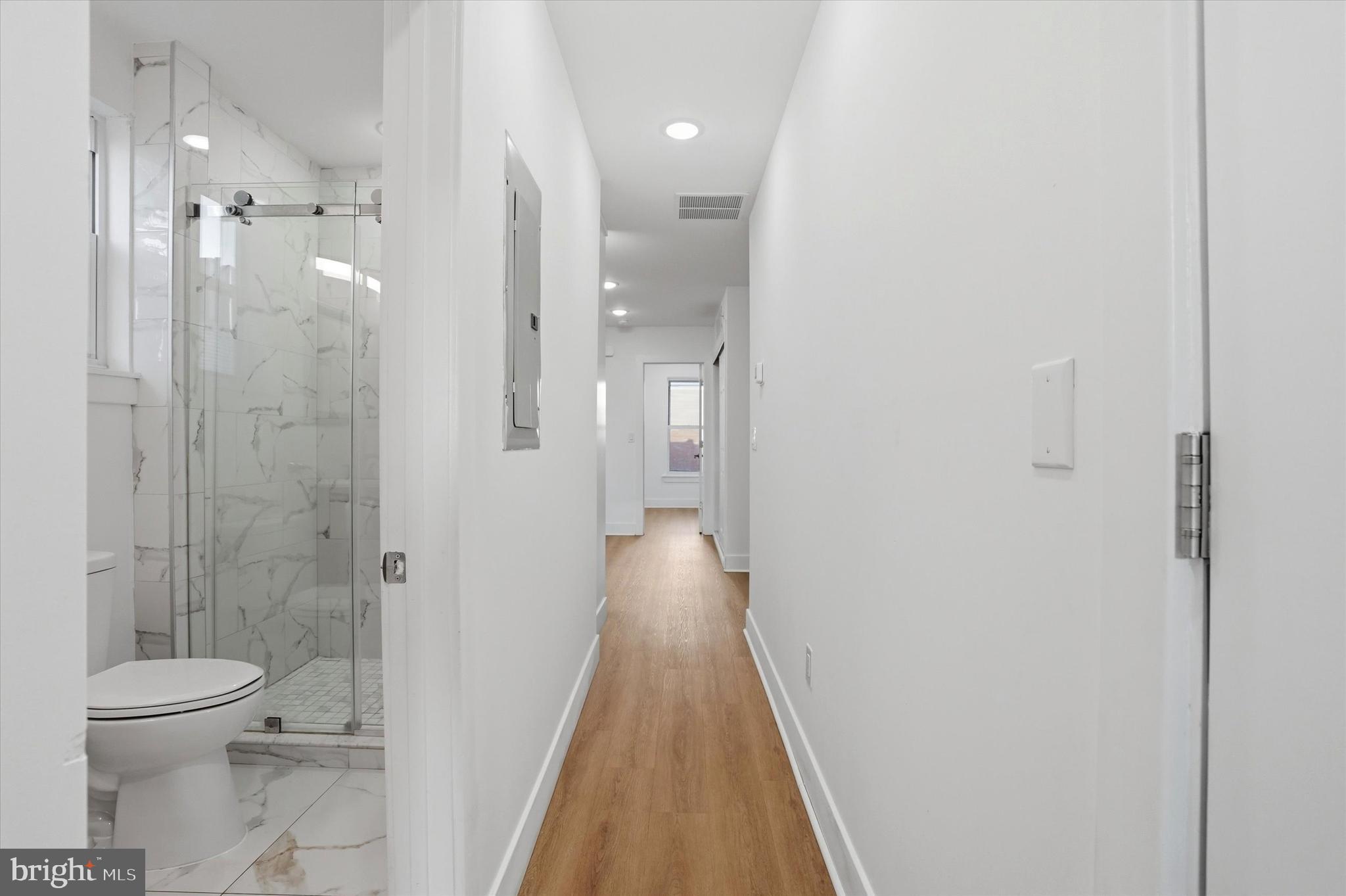 2104 North 8th Street, Unit 3 Philadelphia, PA 19122 - Photo 12 of 15 a view of a bathroom with a shower and a toilet
