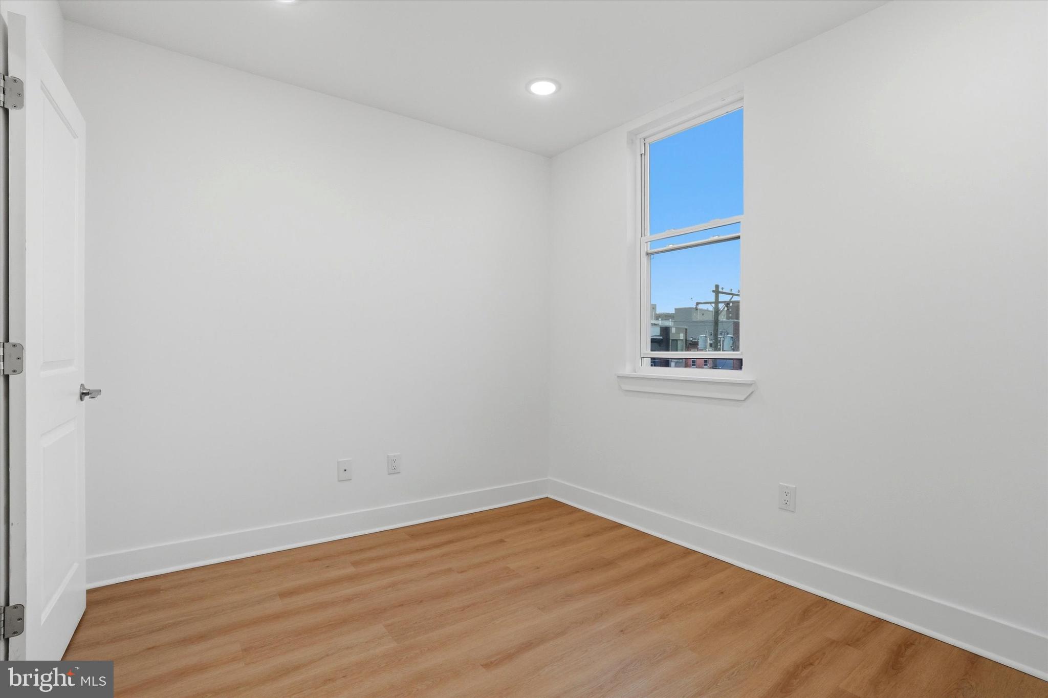 2104 North 8th Street, Unit 3 Philadelphia, PA 19122 - Photo 15 of 15 a view of empty room with wooden floor