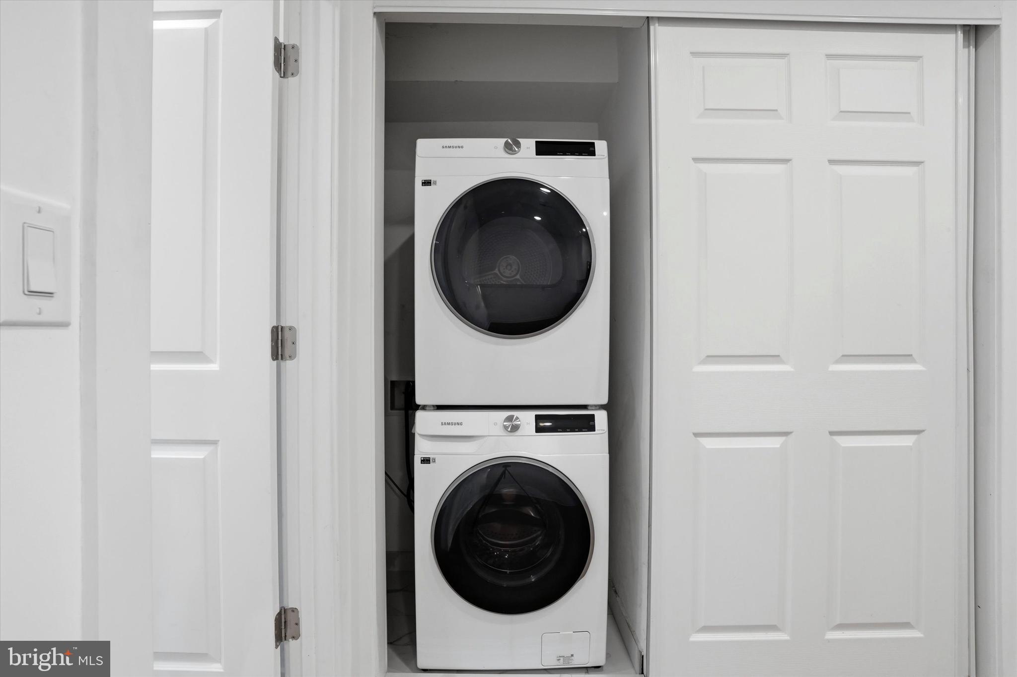 2104 North 8th Street, Unit 3 Philadelphia, PA 19122 - Photo 7 of 15 a utility room with dryer and washer