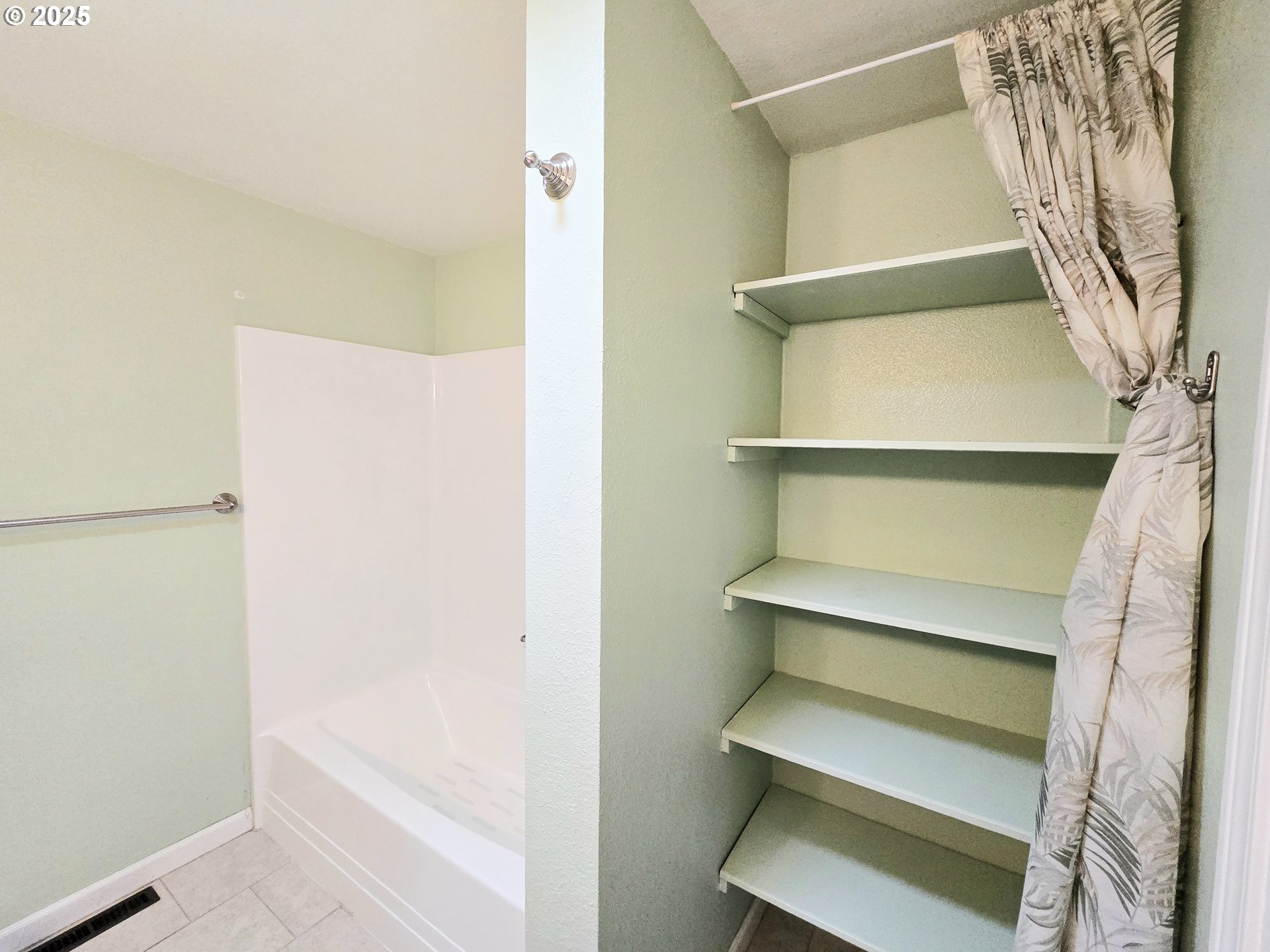 239 Arrow Way Myrtle Creek, OR 97457 - Photo 14 of 25 a view of walk in closet with empty racks