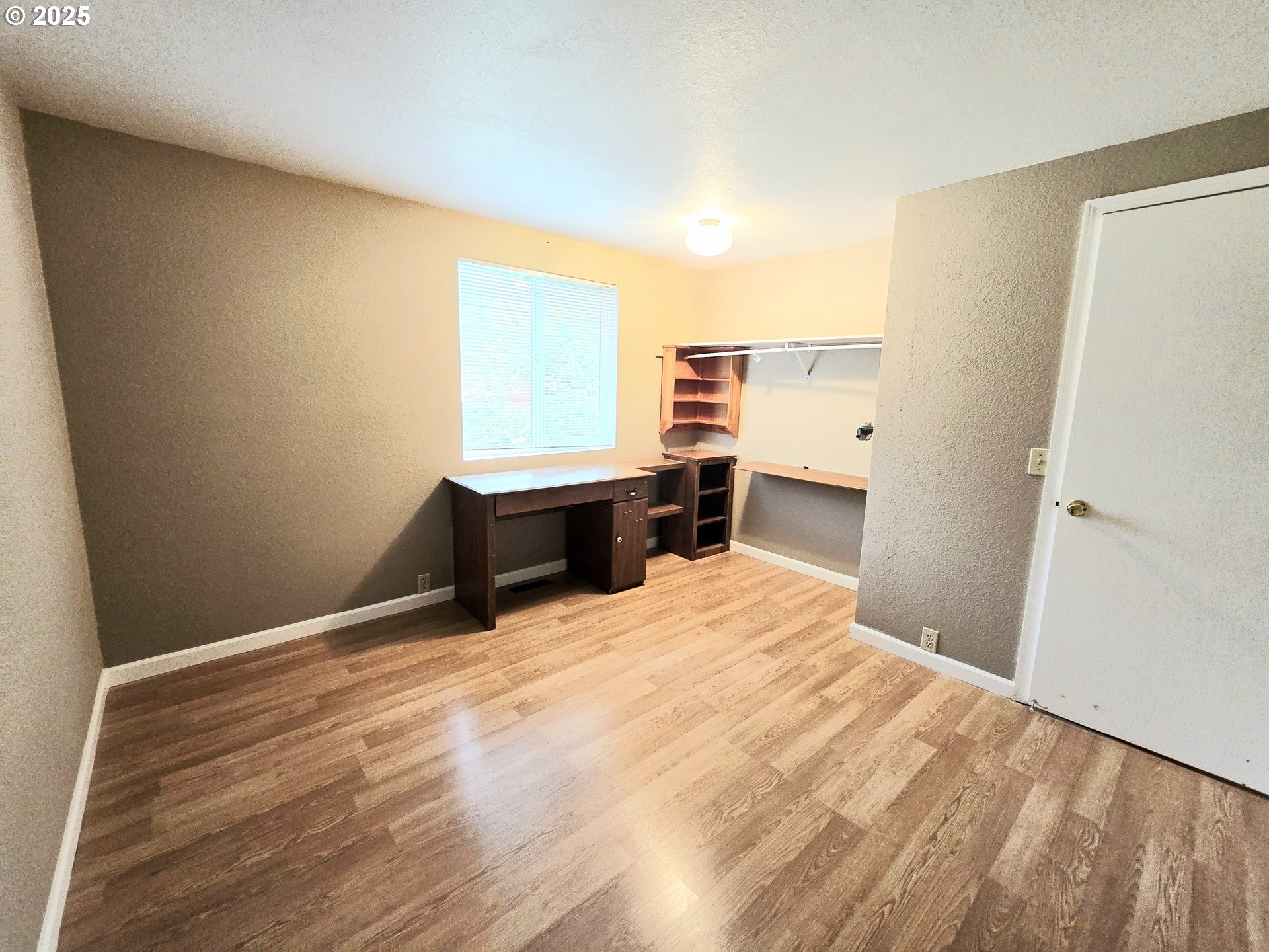 239 Arrow Way Myrtle Creek, OR 97457 - Photo 15 of 25 a room with a bed and cabinets