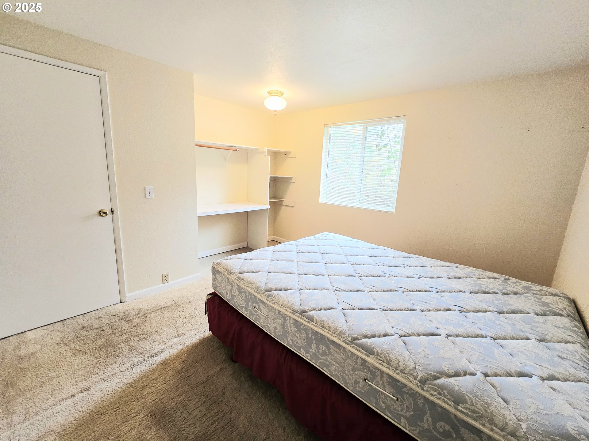 239 Arrow Way Myrtle Creek, OR 97457 - Photo 16 of 25 a bedroom with a bed and window