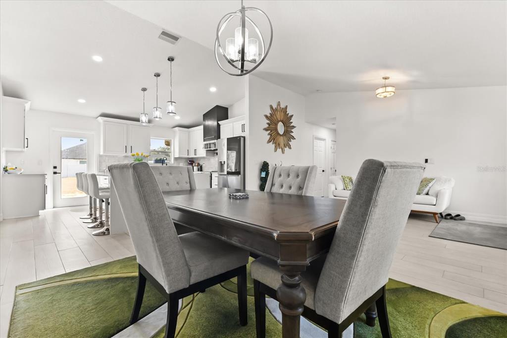 812 Chastain Road Seffner, FL 33584 - Photo 7 of 26 a view of a dining room with furniture