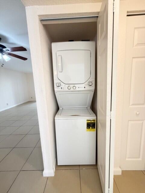 2950 Olivewood Terrace, Unit 1120 Boca Raton, FL 33431 - Photo 5 of 12 a utility room with dryer and washer