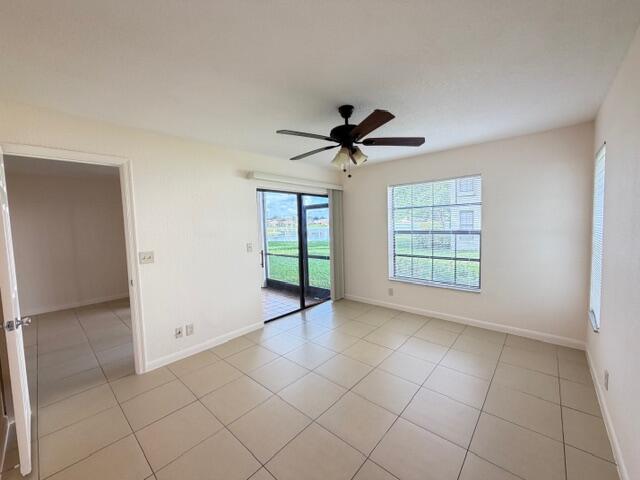 2950 Olivewood Terrace, Unit 1120 Boca Raton, FL 33431 - Photo 6 of 12 a view of an empty room with a window