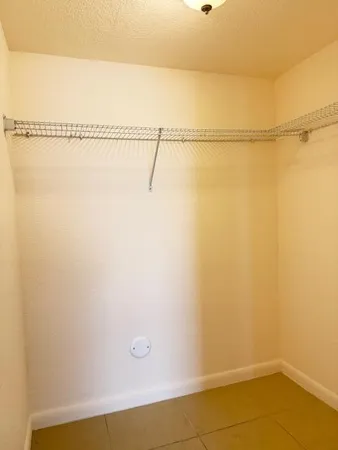 a view of a room with an empty walk in it