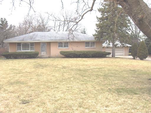 4220 Venard Road Downers Grove, IL 60515 - Photo 1 of 1 a front view of a house with a yard
