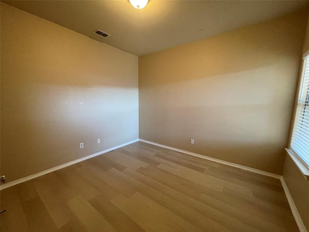 101 Sunburst Court, Unit 107 Weatherford, TX 76087 - Photo 11 of 24 a view of an empty room