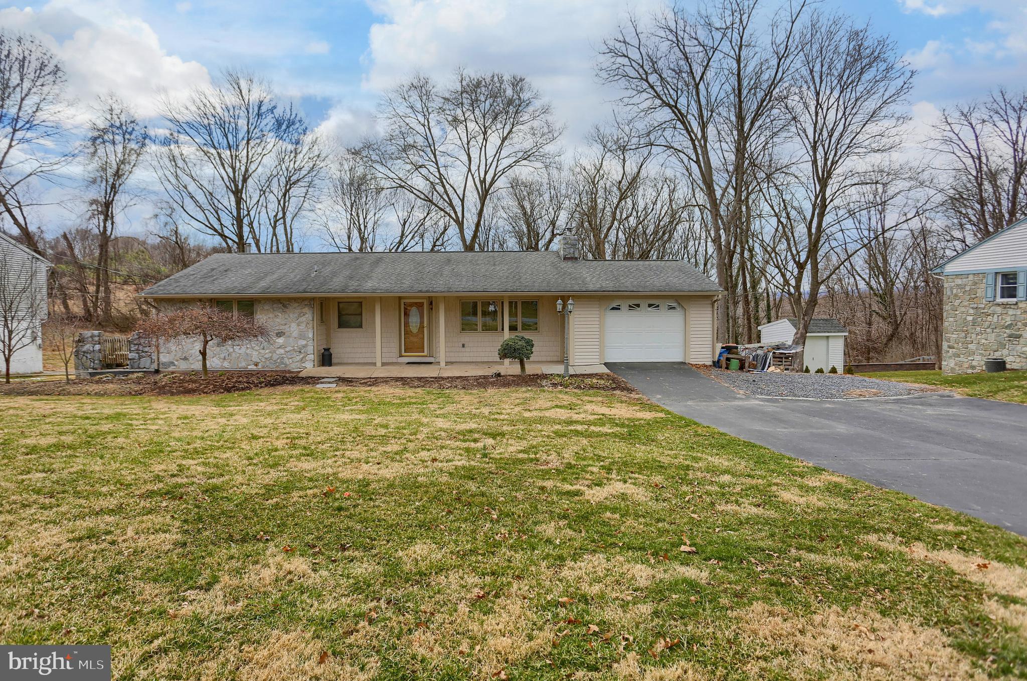 4 beds, 2.5 baths & over a half acre lot!