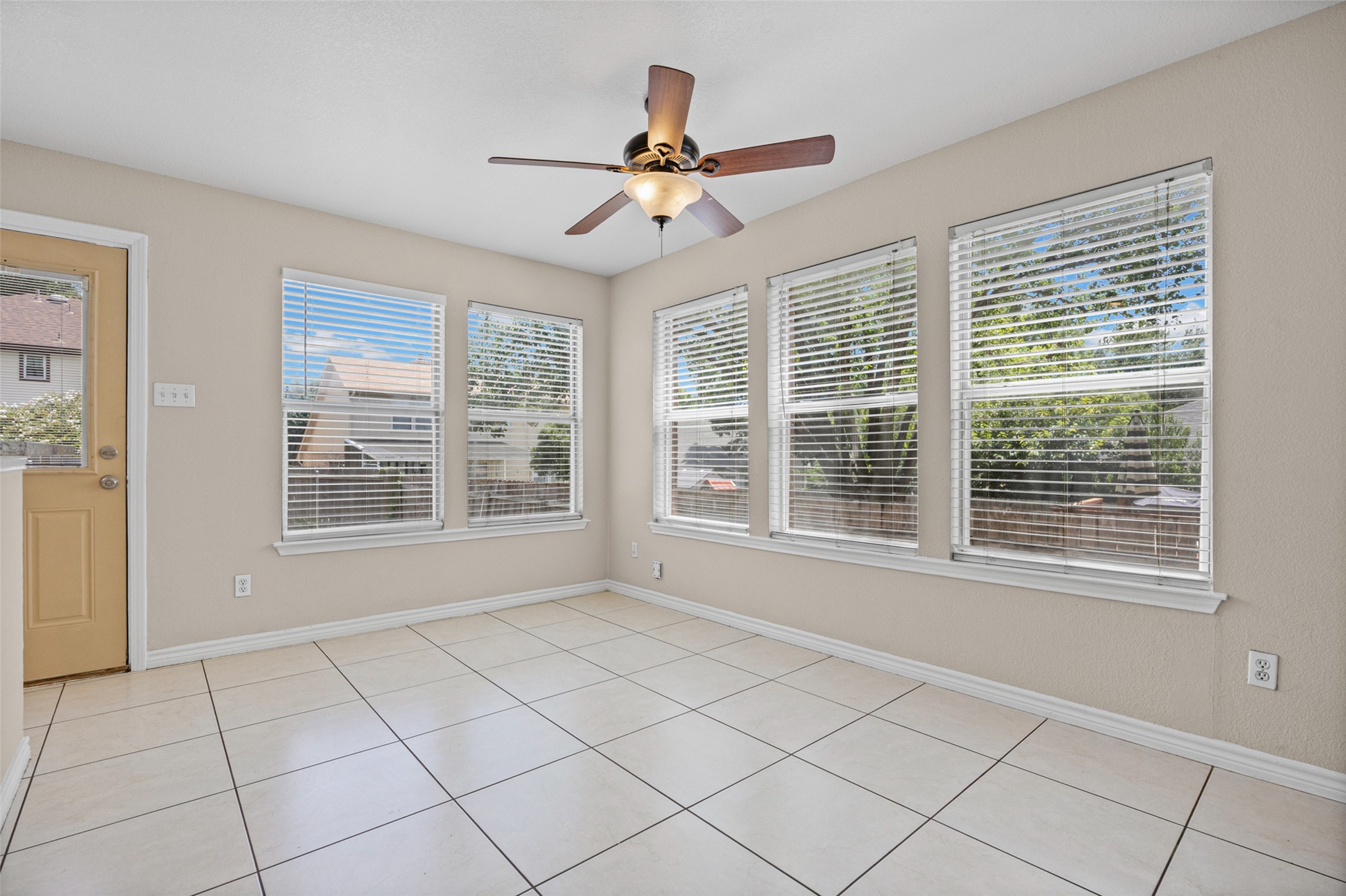2432 Roundabout Lane Round Rock, TX 78664 - Photo 6 of 22 A well-lit area with ample natural illumination, offering versatile space for various uses.