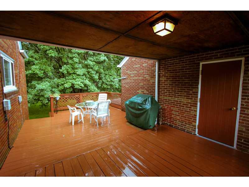 1981 Brodhead Road Aliquippa, PA 15001 - Photo 3 of 16 Patio/Deck. Partial Covered Deck for Relaxing Rain or Shine.