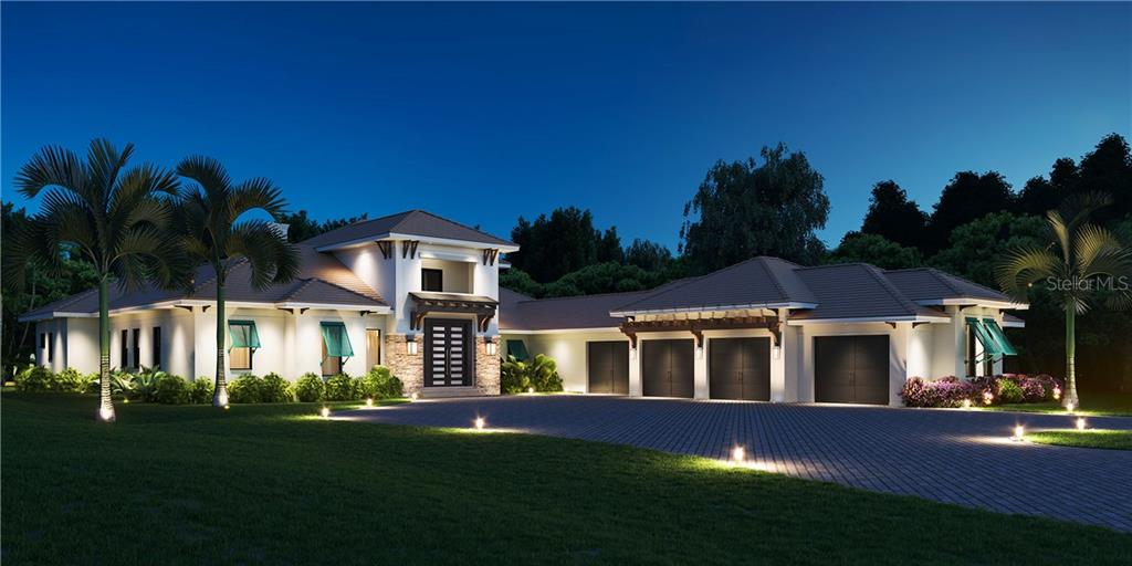 16902 Vinci Way Montverde, FL 34756 - Photo 1 of 1 a front view of a house with a garden